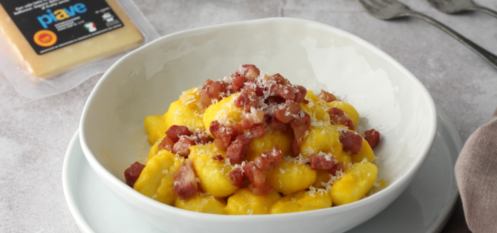 Gnocchi with Piave PDO, saffron and crispy bacon